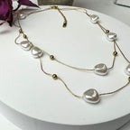 DOBLE PEARL | Colar Duplo tipo Gargantilha em Malha Dourada com Pérolas em Aço Inoxidável