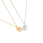 LOVE | Colar com Medalha Retangular e Coração em Zircônia em Aço Inox