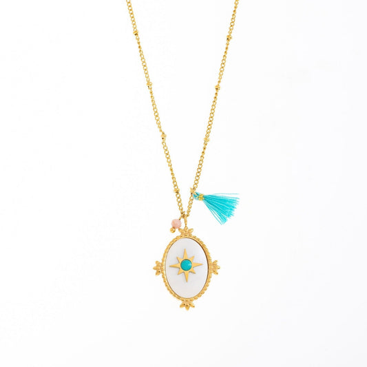 white and blue medal necklace