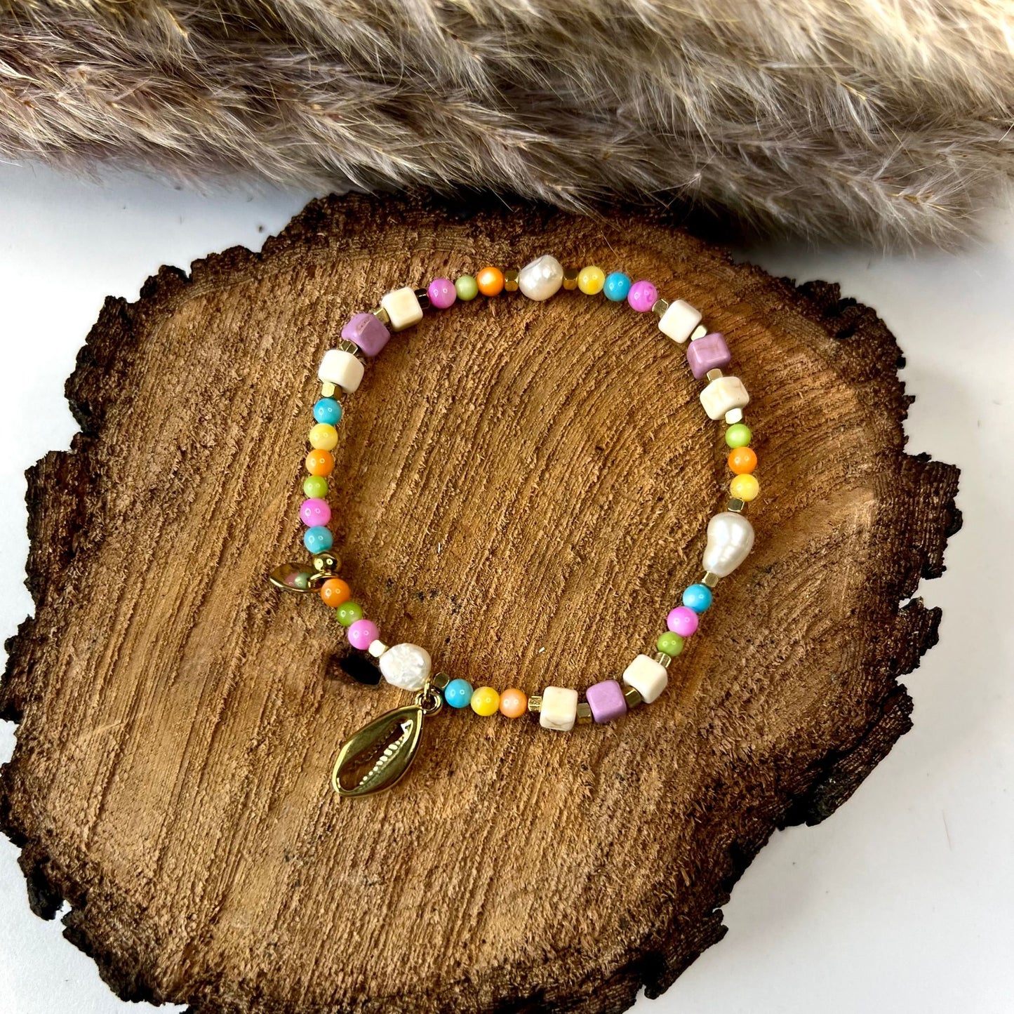 Multicolored bracelet with golden shell | Steel